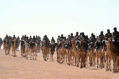 Pro-independence Polisario Front rebel soldiers parade during a ceremony marking the 35th anniversary of the proclamation of independence of the Sahrawi Arab Democratic Republic on February 27, 2011 in the Western Sahara village of Tifariti. AFP PHOTO / DOMINIQUE FAGET / AFP / DOMINIQUE FAGET (Photo credit should read DOMINIQUE FAGET/AFP via Getty Images)