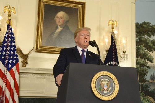 US President Donald Trump during his speech to the nation, announcing military action against Syria for the recent apparent gas attack on its civilians, at the White House, in Washington, US on 13 April 2018 [Mike Theiler/Pool/Getty Images]