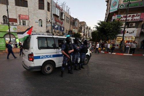 Palestinian police in the West Bank city of Ramallah on 5 July 2021 [ABBAS MOMANI/AFP/Getty Images]