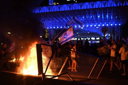 Israeli runs over pro-democracy protesters