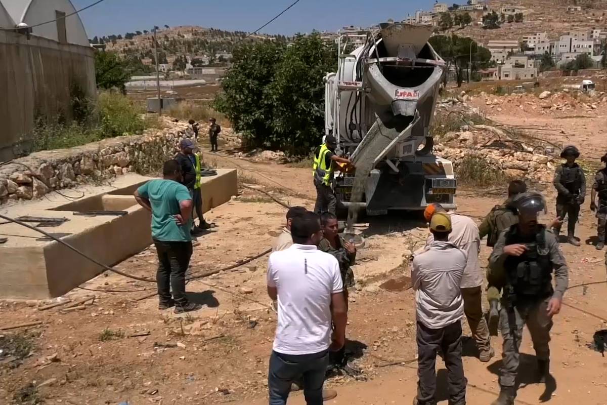 Israeli soldiers seal Palestinian well with concrete